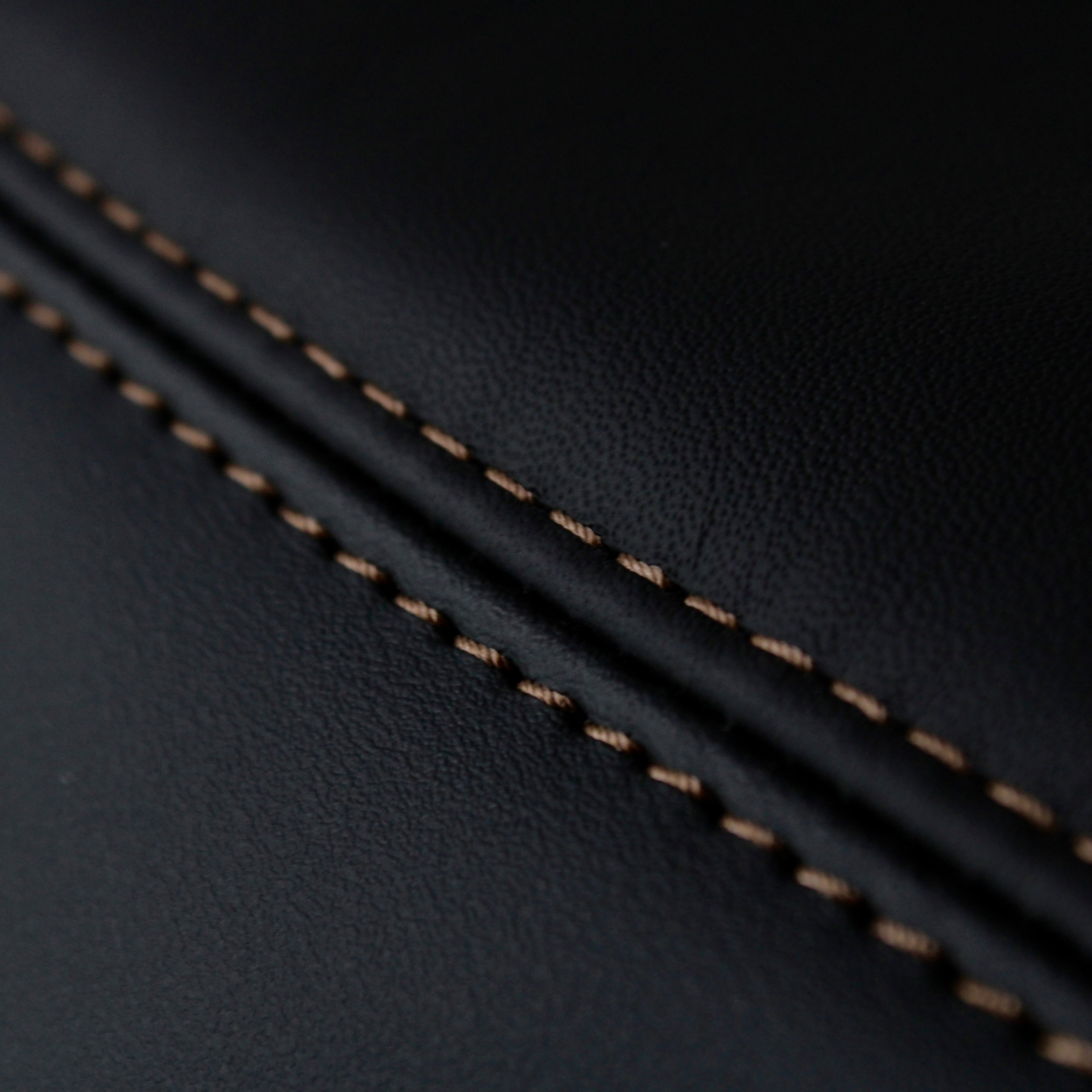 Nissan Skyline R32 GT-R Nappa leather Armrest Cover with Alloy Bronze stitching.