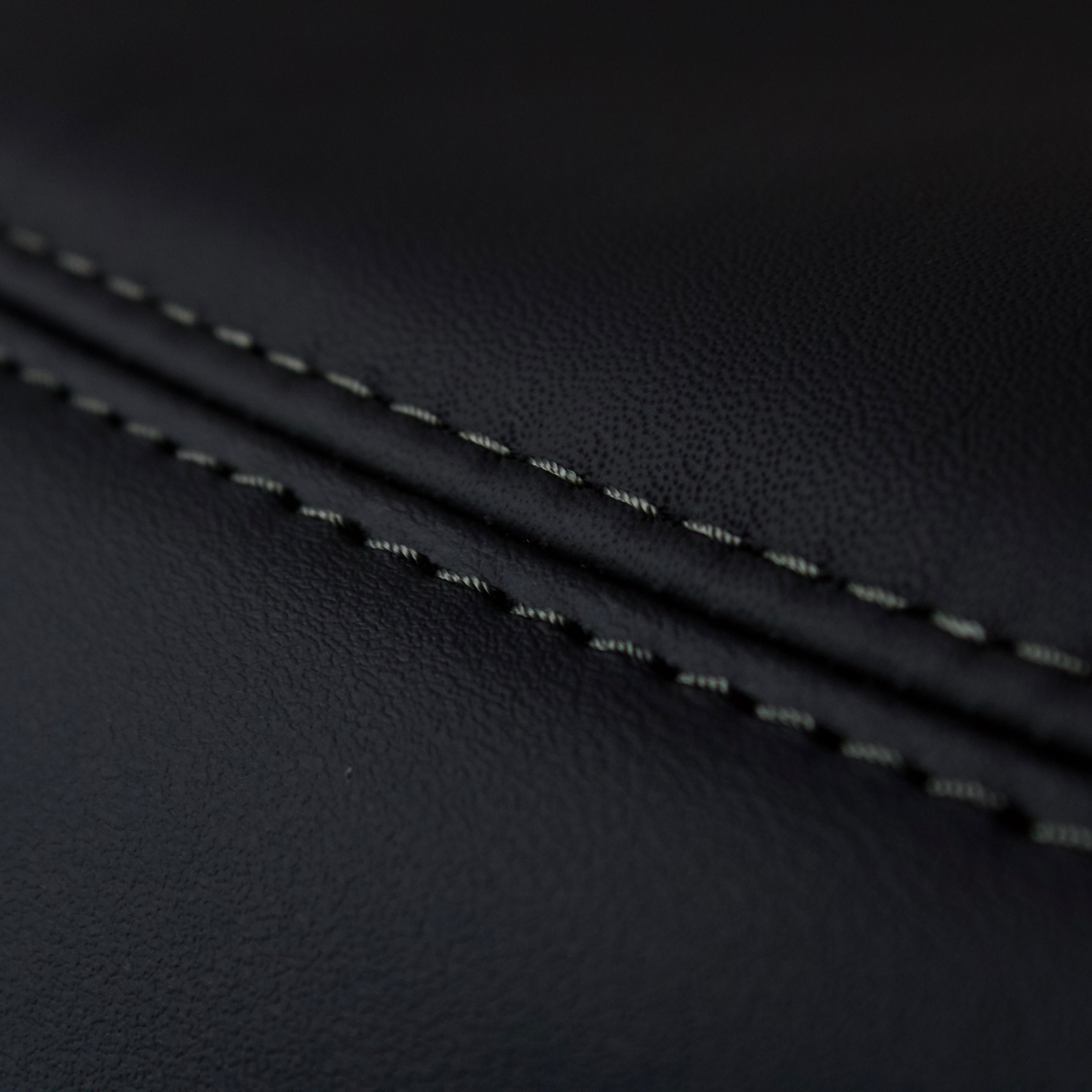 Nissan Skyline R32 GT-R Nappa Leather Armrest Cover with Graphite Grey stitching.